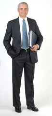 Wall Mural - Businessman full length hand in pocket