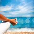 Yoga Hand on Sea Background