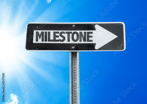 Fotografering Milestone direction sign with a beautiful day