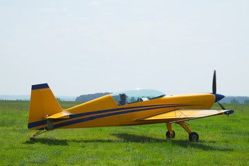 Poster - The image of a sport propeller airplane