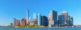 Fototapeta Sawanna - New York City lower Manhattan financial  wall street district buildings skyline on a beautiful summer day with blue sky