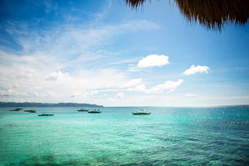 Obraz na płótnie plaża łódź wyspa piękny niebo
