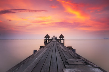 Wall Mural - Landscape of Wooded bridge in the port between sunrise