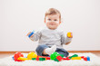 © djoronimo - Little boy playing with blocks