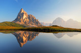 Fototapeta  - Mountain lake reflection, Dolomites, Passo Giau