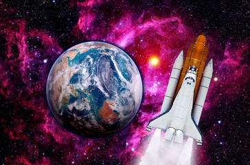 Wall Mural - space shuttle rocket earth