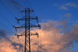 Fototapeta Do akwarium - electricity infrastructure in the setting sunlight