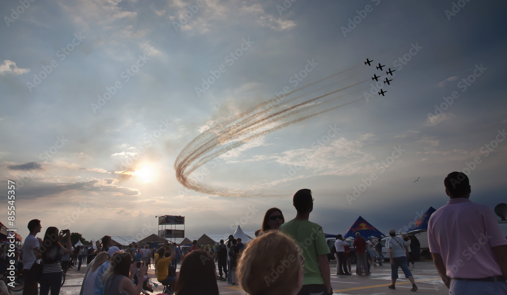 AIRSHOW, ROMANIA JUNE 20TH: AIR FORCES PERFORMING AEROBATIC EXERCISE  - obrazy, fototapety, plakaty 
