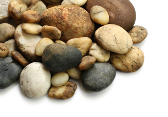 Wall Mural - pile of stones isolated on white background