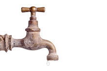 Old And Used Vintage Faucet With Water Drop