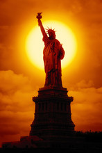 Liberty Statue At Sunset