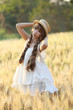 © Oran Tantapakul - Asian girl on wheat