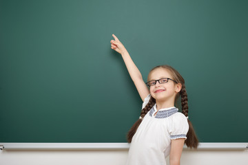 schoolgirl near school board