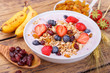 canvas print picture - Healthy breakfast with fresh fruits, yogurt and granola on rustic wooden table