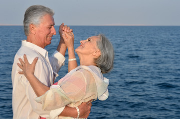 Wall Mural - Elderly couple  at tropical beach