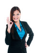 © iPortret - Attractive young businesswoman giving OK gesture over white background