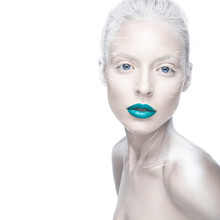 Beautiful Girl In The Image Of Albino With Blue Lips And White Eyes. Art Beauty Face. Picture Taken In The Studio On A White Background.