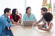 © WavebreakmediaMicro - Colleagues using laptop at office