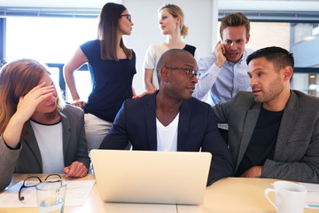 Wall Mural - Group of executives sitting working intensely