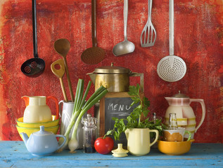 collection of vintage kitchen utensils and food ingredients