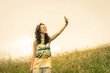 girl takes a selfie during her holiday - people, lifestyle and technology concept