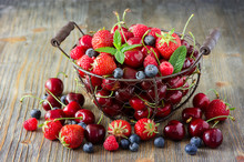 Fresh Ripe Berries, Cherries, Raspberries, Blueberries In Vintag