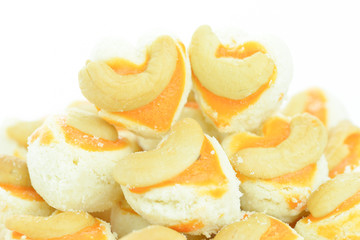 Cashew nut cookie Singapore cookies heart shape on white backgro