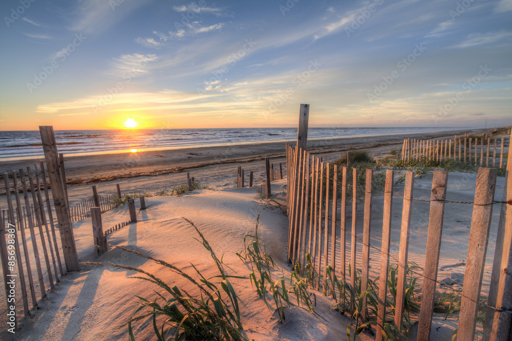 Sunrise as seen from the sand dunes at the Outer Banks, NC around Corolla Beach in September, 2014. - obrazy, fototapety, plakaty 