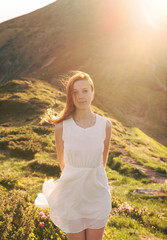 Wall Mural - Sensual woman portrait in the nature on sunset