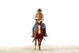 Fototapeta Konie - Mountain cowboy riding his horse in the dirt with a blank white background for text..
