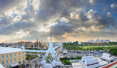 The beauty of the Emerald Buddha Temple at twilight. And while the gold of the temple catching the light. This is an important buddhist temple of thailand and a famous tourist destination.