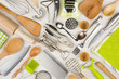 Background of kitchen utensils on wooden kitchen table