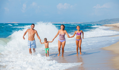 Wall Mural - Family on the beach