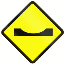 Warning Road Sign In Indonesia: Road Dip