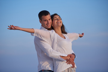 Wall Mural - happy young romantic couple have fun arelax  relax at home