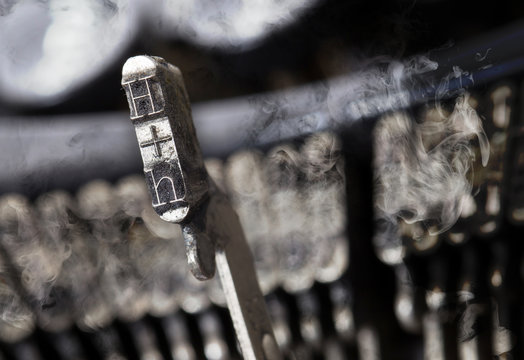 H hammer - old manual typewriter - mystery smoke
