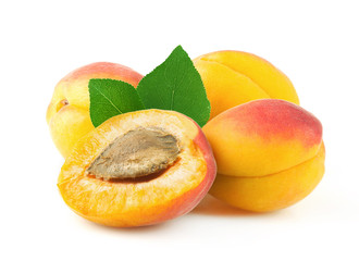 Wall Mural - Ripe apricots isolated on white.