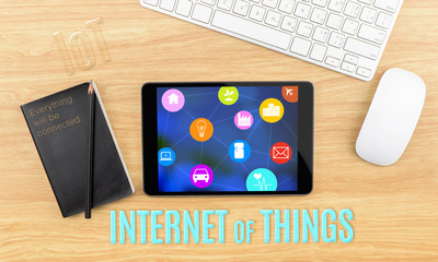 Poster - Tablet, notebook and keyboard on wooden desk with icon about Int