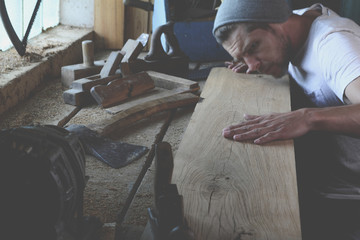 Wall Mural - Woodworker while working in the studio