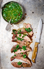 Wall Mural - flank steak  with chimichurri sauce.