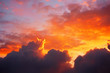 cloudscape at sunset with red clouds