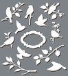 Set of paper birds and twigs