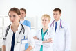 © lenetsnikolai - Confident medical doctors team.