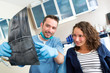 © Production Perig - Young attractive dentist showing x-ray to patient