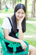 © tiniroma - Portrait of thai student teen beautiful girl Dress black happy and relax On Park