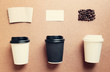 © Nuchylee - Paper coffee cup mock up for identity branding from top view wit