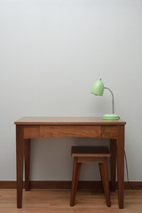 wooden Brown Table with a Lamp in bedroom