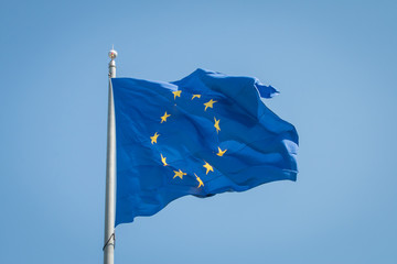 Flag of the european union against blue sky