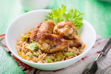 Baked chicken wings with rice