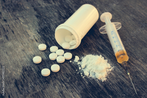 Fotomural drug addiction on the old wooden background